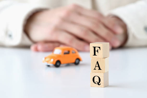 Human thiking about car and wooden blocks with FAQ word